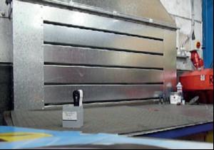 Rear plenum boxes draw fumes away from face