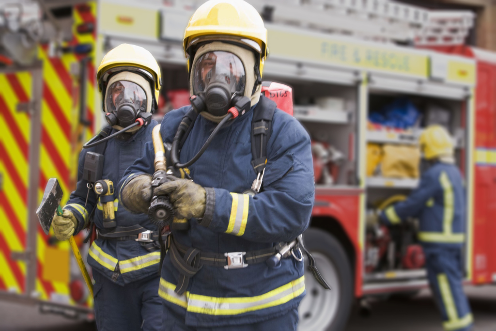 firefighters attending fire in block of flats