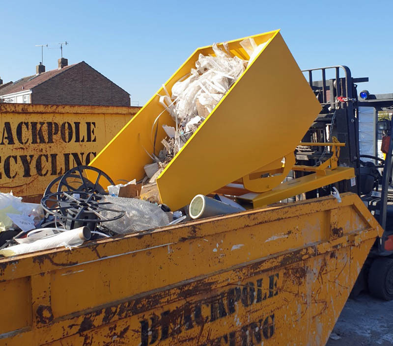 april - forklift tipping skips