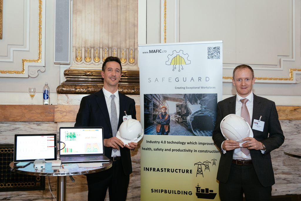 Adrian Cunliffe, Technical Director and Will Woodhead, Managing Director both of Mafic Ltd with their IoT wearable device for the construction industry