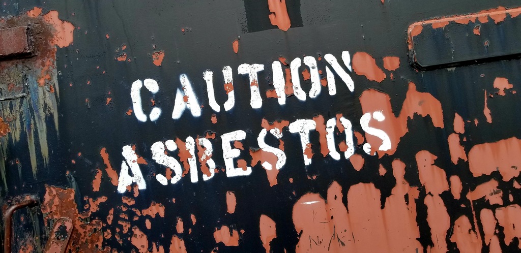 STOCK asbestos warning sign