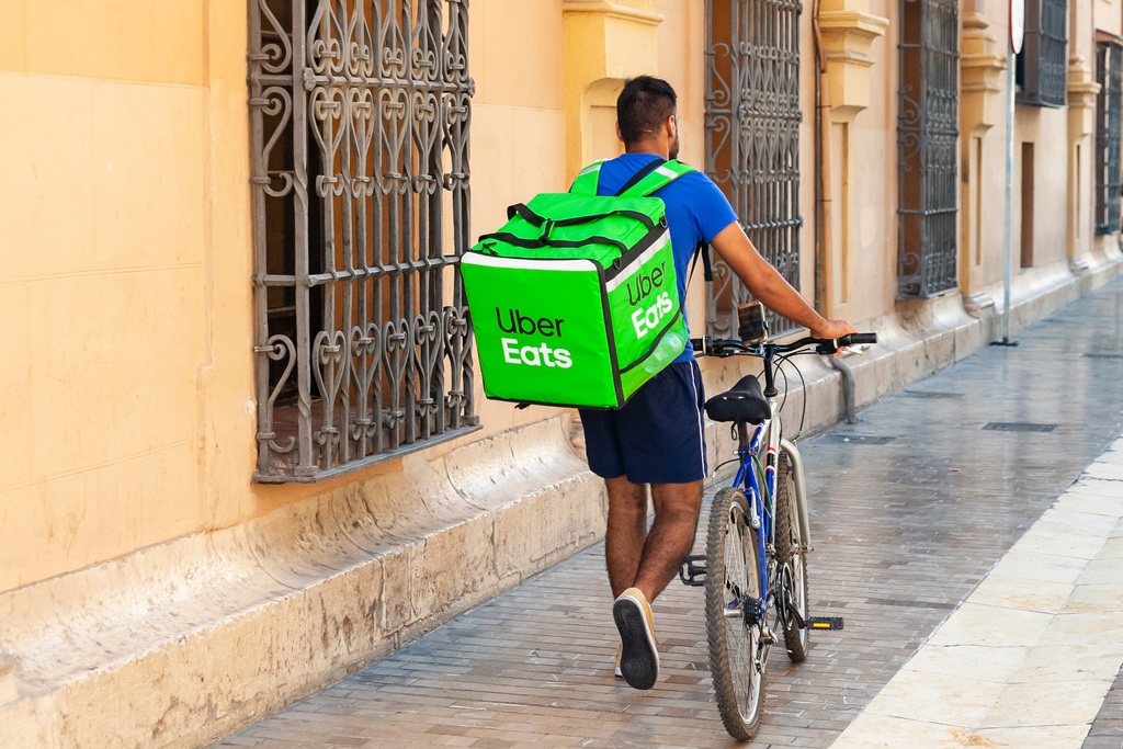 STOCK gig economy delivery person